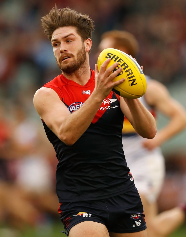 AFL 2016 Rd 15 - Melbourne v Adelaide MELBOURNE, AUSTRALIA - JULY 03: Tomas Bugg of the Demons in action during the 2016 AFL Round 15 match between the Melbourne Demons and the Adelaide Crows at the Melbourne Cricket Ground on July 3, 2016 in Melbourne, Australia. (Photo by Michael Willson/AFL Media)